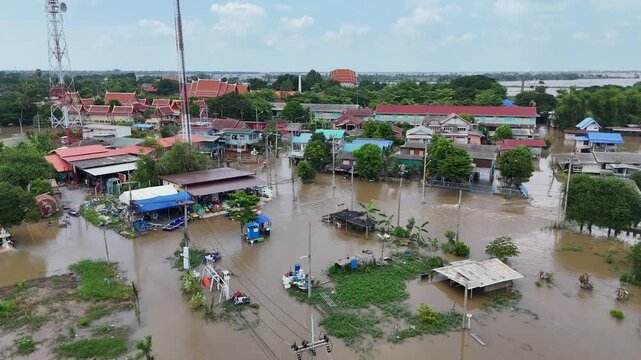October 9, 2026, Sena District, Ayutthaya. Rainwater flowing from the north and heavy rainfall caused small rivers to overflow, flooding riverside homes in rural areas of Ayutthaya, Thailand.