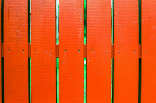 Vibrant Orange Wooden Fence Texture