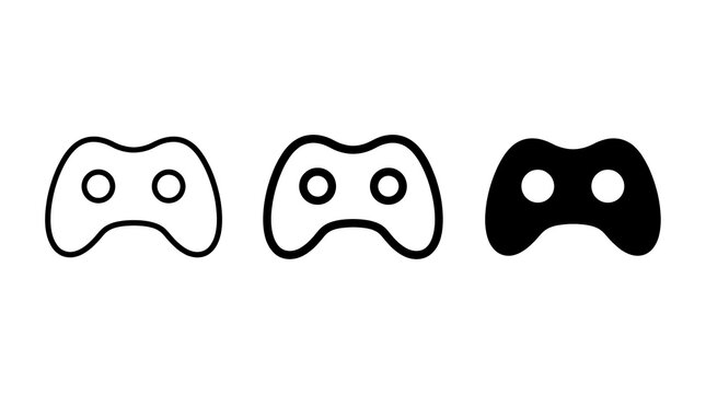 Video game controller icons in outline filled and solid styles during studio lighting for digital media