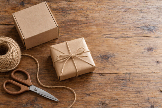 Recycled Kraft Package with Twine and Scissors