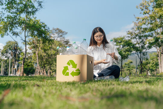 Recycle concept. Young woman sorting plastic bottles into a recycling box for environmental awareness, sustainable to zero waste reduction and Reuse.