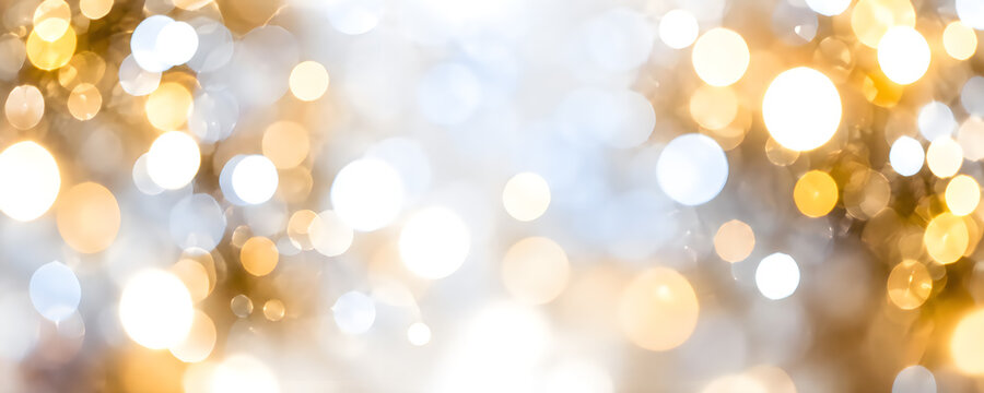 Festive gold and silver bokeh background for christmas celebration