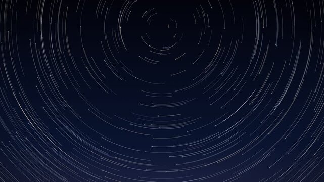 Star trails in the night sky showing the apparent movement of stars around the celestial pole over time