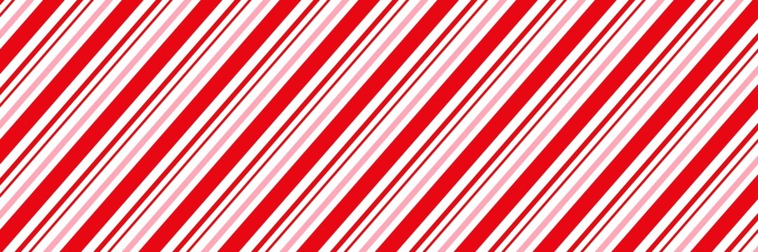 Candy cane Christmas background, peppermint diagonal stripes print seamless pattern.