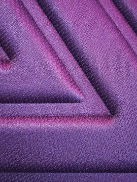 A close-up view features a purple geometric embossed fabric texture with modern diagonal lines and 3D triangular patterns for luxury backgrounds