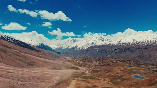 Aerial panorama of the stunning rugged mountain landscapes and snow-capped Himalayan peaks in chandratal region of Spiti Valley, Himachal, India. Captured from a drone.