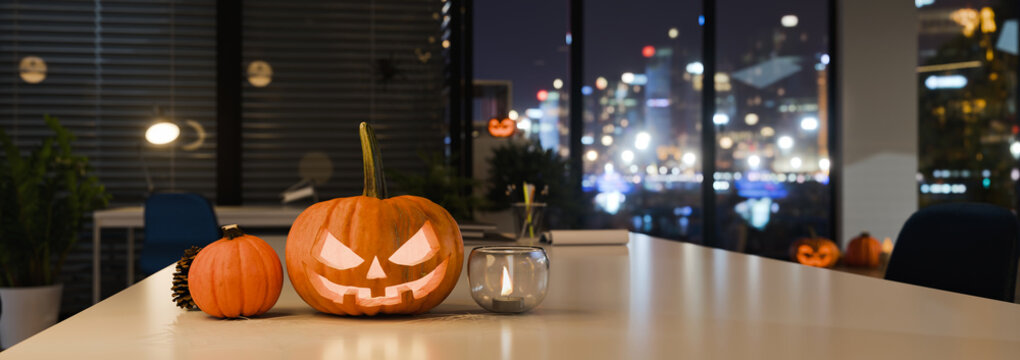 Halloween Pumpkin lantern Decoration on Office Desk at Night