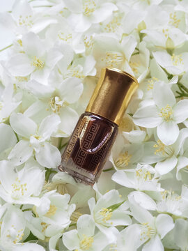 Traditional Arabian Jasmine Attar Perfume Oil Bottle in Blossom Flowers