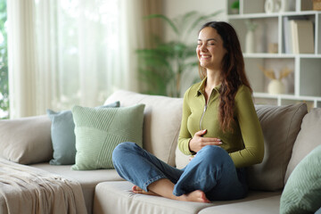 Fototapeta premium Young woman with good bowel tract smiling