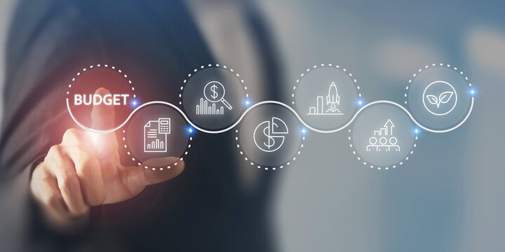 Business Budget Planning, Financial Growth and Sustainability Strategy. Touching a digital interface with financial charts, investment, growth, sustainability icons. Strategic budgeting and planning.