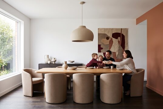 Modern dining room with a family gathered at the table