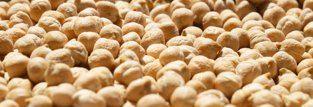 Close up view of beans on a flat surface with natural light highlighting their details
