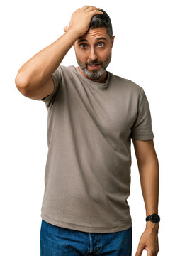 Man, caucasian, gray hair, beard, t shirt, mistake &mdash; hand on head after an error, memory lapse; forgot and trying to remember in a studio portrait