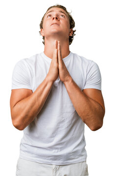 Man caucasian young t shirt, begging and praying, beg pray with hands together, hope expression, emotional studio portrait of a worried, pleading adult