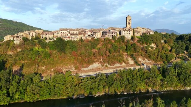 Aerial view above medieval village of Ainsa and castle in Spanish Pyrenees, Huesca, Spain