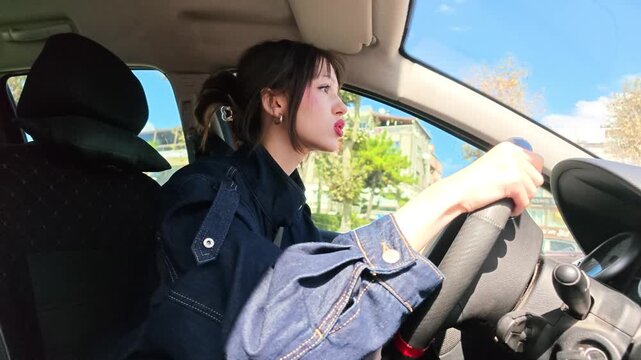 Frustrated Woman Driving Car Looking Annoyed Behind Steering Wheel, Angry Female Driver Experiencing Road Rage Traffic Stress Footage, Transportation and Emotion Concept Video, Stressed Driving Scene
