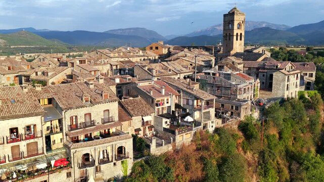 Aerial view above medieval village of Ainsa and castle in Spanish Pyrenees, Huesca, Spain