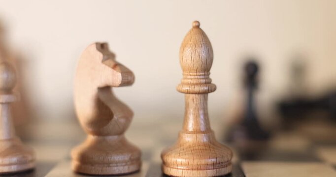 Close‑up of a chessboard with pieces &mdash; a metaphor for business strategy: each move symbolizes a deliberate decision and calculated step toward the goal.