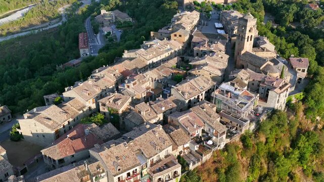 Aerial view above medieval village of Ainsa and castle in Spanish Pyrenees, Huesca, Spain