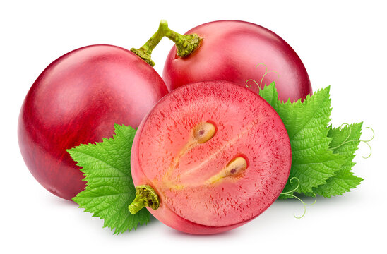Red grapes composition with whole berries and halves with leaves for packaging. Fresh ripe cut set isolated on white background with clipping path