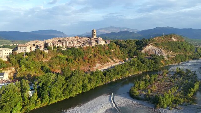 Aerial view above medieval village of Ainsa and castle in Spanish Pyrenees, Huesca, Spain