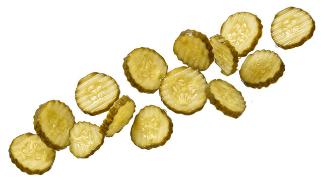 Crinkle cut dill pickle slices flying in the air, sour green marinated cucumber chips, PNG, isolated on transparent background