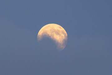 Full moon low in a hazy evening sky © ElNahas OÜ