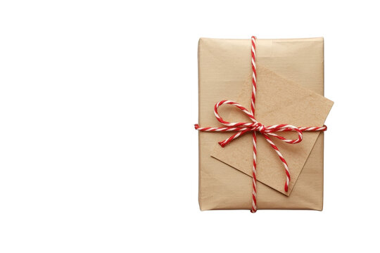 Kraft paper parcel tied with red striped string