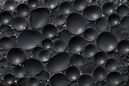 Black obsidian fracture macro texture