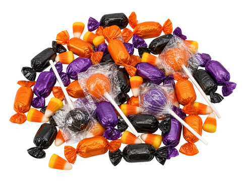 Pile of Halloween candy with wrapped sweets, lollipops and candy corn in orange, purple and black, isolated on transparent background