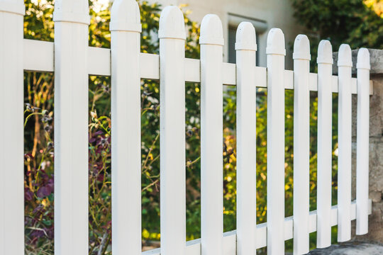 Modern White Plastic Fence with Vertical Slats