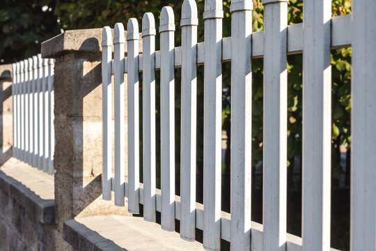 Modern White Plastic Fence with Vertical Slats