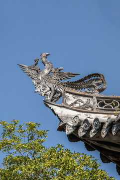 Phoenix grey sculpture on ancient building eaves, East Lake Park, Linhai, Taizhou, Zhejiang
