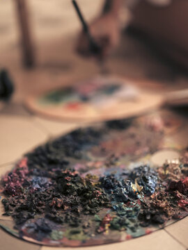 Colorful paint palette close-up art studio abstract texture