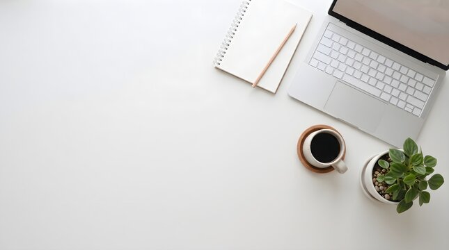 Minimalist workspace with laptop and coffee.