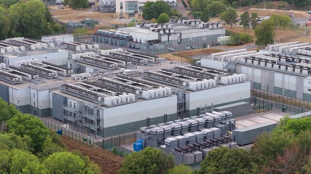 Aerial View of a Large Modern Data Center Facility During the Daytime