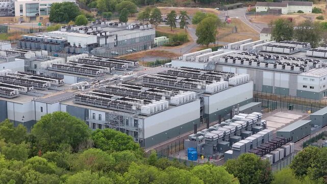 Aerial View of a Large Modern Data Center Facility During the Daytime