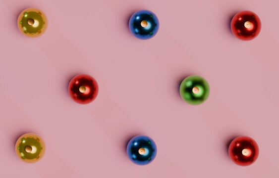 Spaced colorful 3D Christmas balls on a pink surface