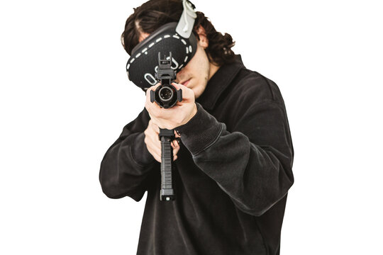 Man wearing virtual reality headset aiming AR-15 rifle controller in VR training simulation