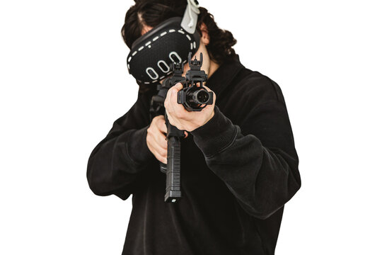 Man wearing virtual reality headset aiming AR-15 rifle controller in VR training simulation