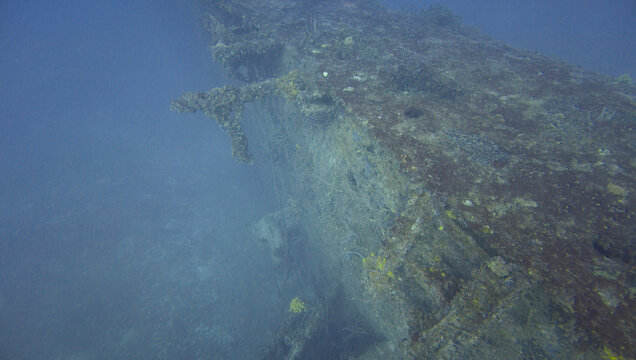 Travel and History: Coral Encrusted Mast and Deck Superstructure on Submerged USCG Bibb Shipwreck Wreckage in Key Largo, Florida