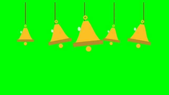 A row of hanging golden bells isolated on a vibrant green screen background.