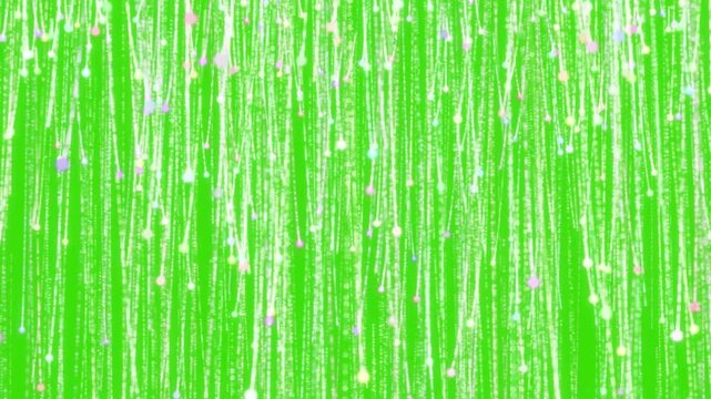 Glowing White And Pastel Magic Particles Falling Downwards Creating Luminous Vertical Trails Over Chroma Key Green Screen Background Perfect For Festive Video Overlay Composition And Digital Waterfall