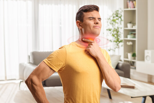 Young man with sore throat