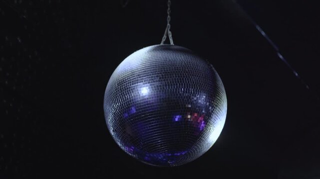 Mirrored Disco Ball Reflecting Club Lights