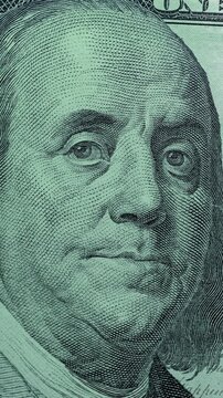 Dollar Bill with Franklin Portrait Under Green Security Scan. Dollar bill with Benjamin Franklin portrait passes through moving green scan light. 