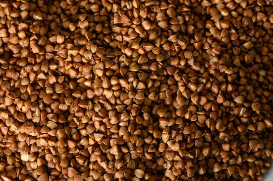 Organic buckwheat grains background texture pattern