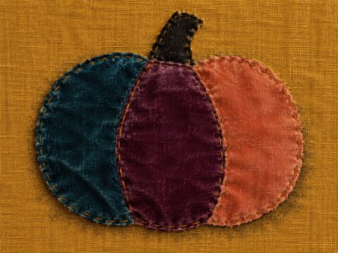 Petrol blue, plum and faded coral velvet sewn with obvious hand stitching