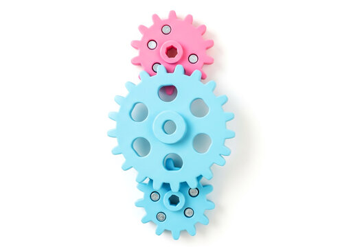 Pink and blue plastic gear wheels connected together