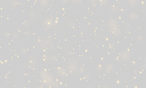 Golden sparkle lights create a dense nighttime glowing effect. The luminous points vary in size and radiate soft star-shaped flares. This glowing background is ideal for festive or magical.